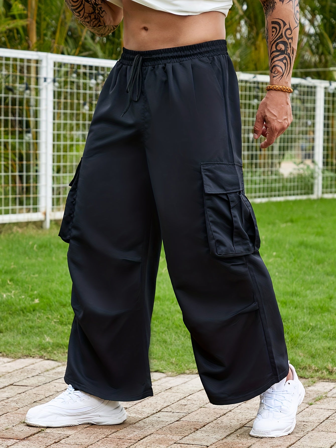 Plus Size Men's Flap Pocket Side Drawstring Waist Trousers, Solid Fashionable Long Pants Harem Pants Design