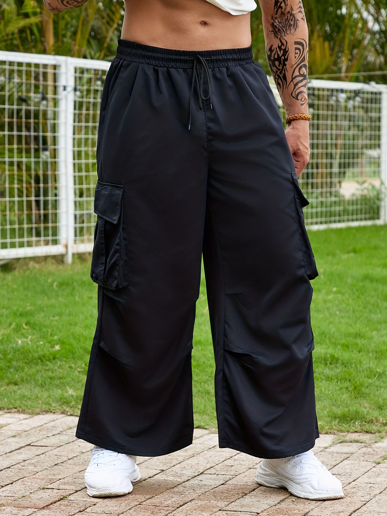 Plus Size Men's Flap Pocket Side Drawstring Waist Trousers, Solid Fashionable Long Pants Harem Pants Design